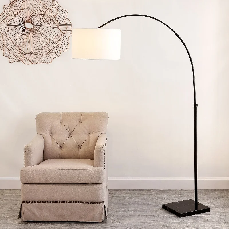 Metal Floor Lamp with a Matte Black Finish for a Sleek LookMetal Floor Lamp with a Matte Black Finish for a Sleek LookSAFAVIEH Lighting Josselyne 71-inch Floor Lamp - 17" W x 17" D x 71" H - Black - 17Wx17Dx71H Metal Floor Lamp with a Matte Black Finish for a Sleek LookMetal Floor Lamp with a Matte Black Finish for a Sleek LookSAFAVIEH Lighting Josselyne 71-inch Floor Lamp - 17" W x 17" D x 71" H - Black - 17Wx17Dx71H