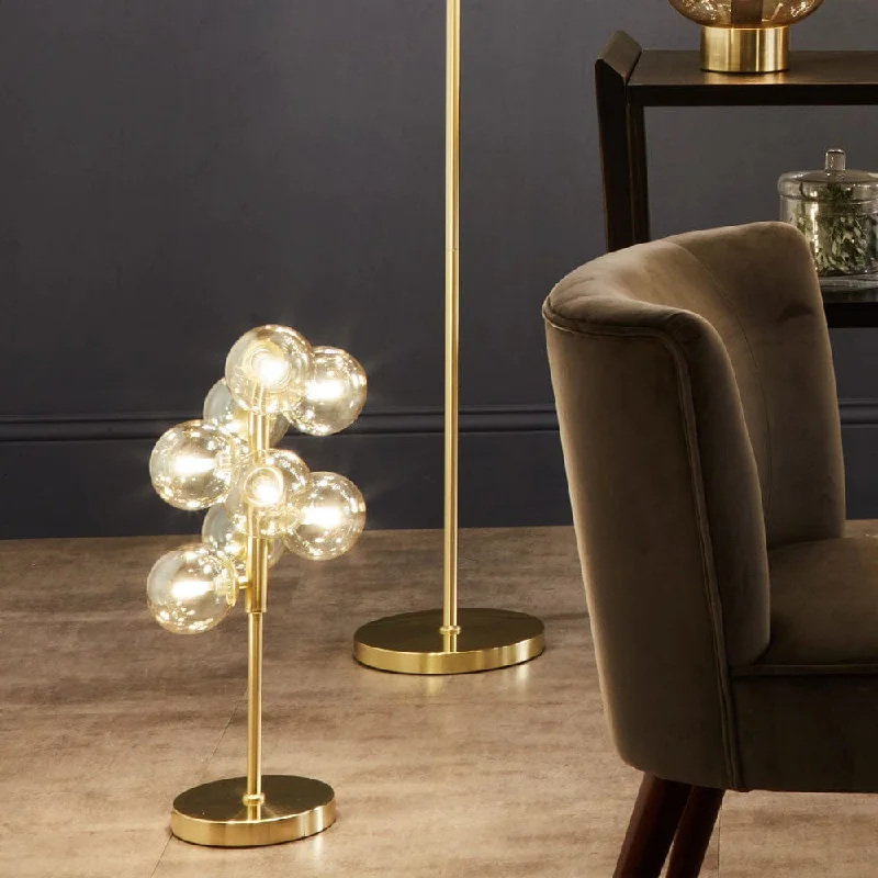 leather table lamps with a distressed texture for a rugged charmleather table lamps with a distressed texture for a rugged charmVecchio Lustre Glass Orb and Gold Metal Table Lamp